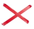 Red sticky tape criss-cross on a white isolated background