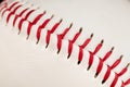 Red stitches on the seam baseball