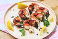 Red stone crab claw - Cooked crabs boiled on wooden plate with lemon on plate served seafood Royalty Free Stock Photo