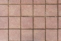 Red stone paving slabs, stone background, paving stone pattern Royalty Free Stock Photo