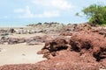 the red stone and rock on the sand beach in clear blue sky and n Royalty Free Stock Photo