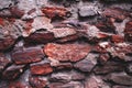 Red stone wall texture close-up Royalty Free Stock Photo