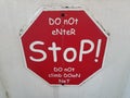 Red stop do not enter sign octagon on wall