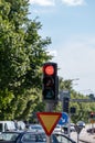 A red stop light with car congestion visible in the background Royalty Free Stock Photo