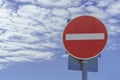 Red stop road sigh on blue cloudy background Royalty Free Stock Photo