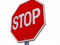 A red stop sign with the word STOP on it Royalty Free Stock Photo