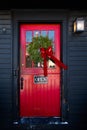 Store entrance door with open sign and Christmas wreath Royalty Free Stock Photo