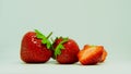 Red strawberries close view on white background Royalty Free Stock Photo