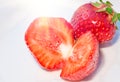 Red strawberries closeup on white dish, background Royalty Free Stock Photo