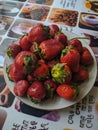 Red strawberries on the kitchen table in K Kamen-na-Obi, Altai, Russia. Vertical