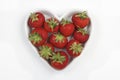 Red Strawberries In A Love Heart Shaped Dish