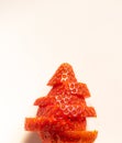 Red strawberry cut to recreate a tree on a white background. Healthy food concept