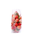 Red strawberry fruit in clear plastic bag isolated on white background , clipping path Royalty Free Stock Photo