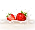 Red strawberry fruits falling into the milky splas Royalty Free Stock Photo