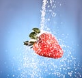 Red strawberry sprinkled with white sugar