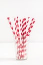 Red Straws Straws in Glass White Background Vertical Royalty Free Stock Photo