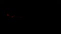 Red streaks light abstract animation background. Seamless loop