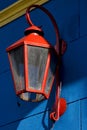 red street lamp and a blue yellow
