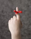 Red string around a finger Royalty Free Stock Photo