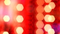 Red string lights, wood background light bulbs bokeh merry Christmas street lighting in street party in town Royalty Free Stock Photo