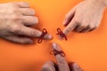 Red Strings Tied Around a Fingers. Memory and Reminder Knot. Family. Father, mother and child Royalty Free Stock Photo