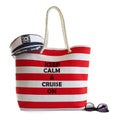 Red stripe beach bag, captains hat and sunglasses