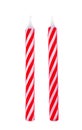 Red striped birthday candles on white Royalty Free Stock Photo