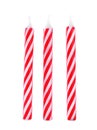 Red striped birthday candles isolated Royalty Free Stock Photo