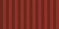 Red striped knitwear material backdrop. Knitting lined wear textile background. Seamless knit texture. Knitted clothes fabric Royalty Free Stock Photo