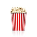 Red striped popcorn bucket isolated on white background. Royalty Free Stock Photo