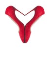 Red suede shoes stacked in the form of heart on white background Royalty Free Stock Photo