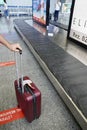 Bodrum, Turkey - August, 2020: Red suitcase near baggage claim line at the airport, Suitcases in airport departure Royalty Free Stock Photo