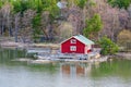 Red house on rocky shore of Ruissalo island, Finland Royalty Free Stock Photo