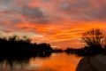 Red sunset over calm river Royalty Free Stock Photo