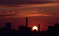 Red sunset over the city silhouette Royalty Free Stock Photo