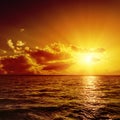 Red sunset over dark water Royalty Free Stock Photo