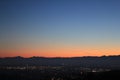 Red sunset over the hill and mountains skyline