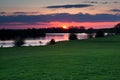 Red sunset over river in Gelderland