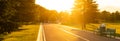 red sunset over road park Royalty Free Stock Photo