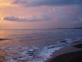 Red sunset over the sea, rich in dark clouds, rays of light Royalty Free Stock Photo