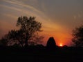 Red sunset in a rural area, wildfire smoke makes the sky red