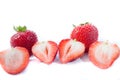 Red super sweet strawberry;s with green tops two showing off for you Royalty Free Stock Photo