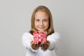 Red surprise gift present box in kid hands on white background Royalty Free Stock Photo