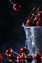 Red sweet cherries in a metal bucket on a dark and blue background. Summer taste. Fresh berries under the water drops. Royalty Free Stock Photo
