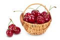 Red sweet cherry in a wicker basket isolated on white background with clipping path and full depth of field Royalty Free Stock Photo