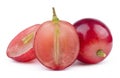 Red sweet grapes and grape slice isolated on white background.