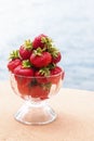 Red sweet strawberries in a glass