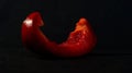 Red sweetpepper on a black background. Close-up. Royalty Free Stock Photo