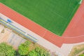 Red synthetic rubber running track on stadium Royalty Free Stock Photo