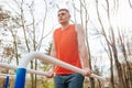 Red T-Shirt, Strong Determination A Male Athlete& x27;s Outdoor Workout. The parallel Royalty Free Stock Photo